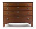 An American Walnut Bowfront Chest of Drawers