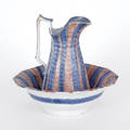 Blue and red rainbow spatter pitcher and bowl 19th c