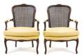 A Pair of Louis XV Style Walnut Fauteuils
