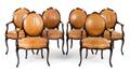 A Set of Twelve Louis XV Style Mahogany Dining Chairs