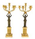 A Pair of Empire Style Gilt and Patinated Bronze FiveLight Figural Candelabra
