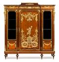 A Louis XVI Style Gilt Bronze Mounted Mahogany and Fruitwood Vitrine Cabinet