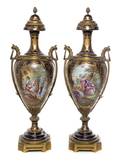 A Pair of Sevres Gilt Bronze Mounted Porcelain Urns