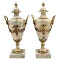 A Pair of Neoclassical Style Gilt Bronze Mounted Marble Urns