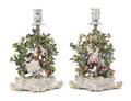 A Pair of Meissen Bocage Porcelain Figural Candlesticks