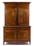 A Louis XV Provincial Walnut Stepback Cupboard