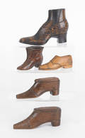 Two mahogany boot form snuff boxes