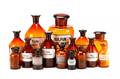 Collection of 15 Amber Glass Apothecary Bottles