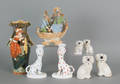 Collection of figural pottery and porcelain to include Staffordshire spaniels