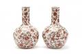 Pair Of Chinese Iron Red Floral Motif Bottle Vases