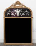 A Neoclassical Gilt Wood and Etched Glass Mirror