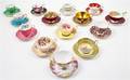A Collection of English Porcelain Cups and Saucers