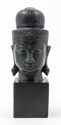 A Southeast Asian Patinated Bronze Buddha Head