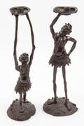 A Pair of Japanese Bronze Figural Candlesticks