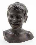A Bronze Bust of a Smiling Boy