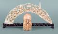 Chinese carved ivory tusk together with a mask