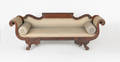 Empire carved mahogany sofa