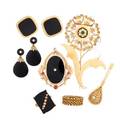 Nine pieces onyx or yellow gold jewelry