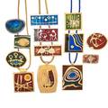 13 artisanal enameled brooches or pendants