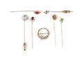 Six 10K14K gold stick pins