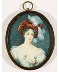 A PORTRAIT MINIATURE OF A WOMAN 18TH19TH CENTURY painted on ivory