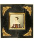 A PORTRAIT MINIATURE OF A WOMAN 18TH19TH CENTURY painted on ivory