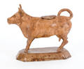 Earthenware cow creamer and cover ca 1850