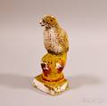 Chalkware Figure of a Falcon on a Ball