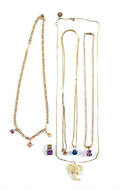 Four necklaces and pendants with 14K yellow gold chains to include