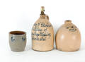 Three pieces of stoneware to include a jug inscribed  Levy Glosking Distillers of Pure Rye Whiskey Dover