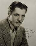 WARNER BAXTER PHOTOGRAPH SIGNED TO HAROLD LLOYD