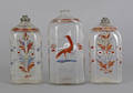 Three Stiegel type enameled glass bottles early 19th c
