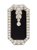 An Art Deco Platinum Diamond and Onyx PendantClip Brooch