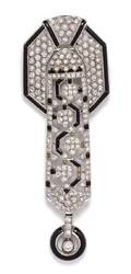 An 18 Karat White Gold Diamond and Onyx Pendant Brooch