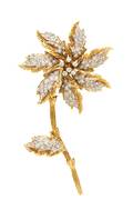 An 18 Karat Bicolor Gold and Diamond Flower Brooch