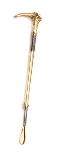 A Retro Yellow Gold and Platinum Riding Crop Pin