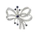 A White Gold Sapphire and Diamond Bow PendantBrooch