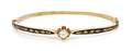 A 14 Karat Yellow Gold Diamond and Enamel Bangle Bracelet