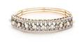 A Bicolor Gold Cultured Pearl and Diamond Bangle Bracelet