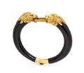 A 18 Karat Yellow Gold Buffalo Horn and Ruby Bangle Bracelet Gay Freres