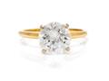 A Yellow Gold and Diamond Solitaire Ring
