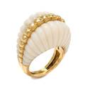 An 18 Karat Yellow Gold and White Coral Bombe Ring