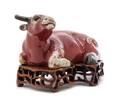 A Copper Red Glazed Porcelain Figure of a Water Buffalo