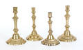 Four French brass candlesticks
