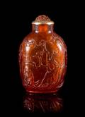 A Carved Amber Snuff Bottle