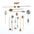 Twelve 14K gold stick pins