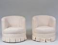 PAIR OF UPHOLSTERED TUB CHAIRS