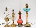 GROUP OF FOUR NAPOLEON III STYLE OIL LAMPS