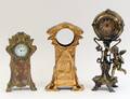 TWO EARLY 20TH CENTURY GILT METAL TABLE CLOCKS