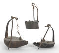 Three iron Betty lamps